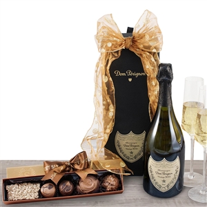 A bottle of Dom Perignon Champagne beautifully boxed and handmade truffles