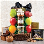 A wicker basket a filled with fruit and Kosher certified nuts, cheese and crackers