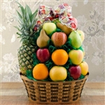 A wicker basket a filled with twenty-nine pieces of fresh fruit, including a pineapple
