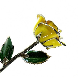 Real yellow rose preserved in lacquer and trimmed in platinum
