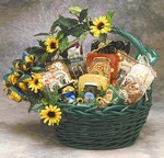 Gourmet foods Gift Basket in a green wicker basket decorated with fake sunflowers
