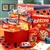 A Large Red Gift Box Filled With Games and Snacks