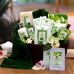 Bamboo gift basket filled with all the things you need for a spa day featuring, high quality aromatic combination scents of cucumbers and melons.