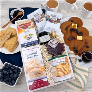 A breakfast gourmet gift basket in a wooden gift crate containing pancake mix, real maple syrup, scone mix, real blueberry jam, coffee and tea.