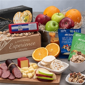 Gift box with fruit, nuts, meat, cheese and crackers.