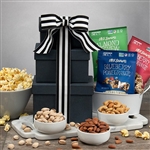 3 luxurious tiered black boxes filled with nuts and popcorn
