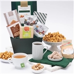 A gift basket with coffees, teas, and gourmet snacks