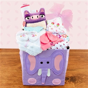 Collapsible animal storage cube full of clothing items for baby girl.