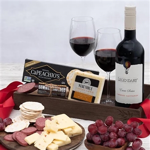 Wood crate tray with a red wine cheese and sausage