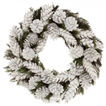 A real cedar wreath with real pine cone varieties covered in snow