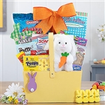An Easter basket with carrots hanging across the front has a 6" plush bunny and Easter treats.