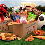 A care package filled with treats with a sports fanatic themed box and ribbon.