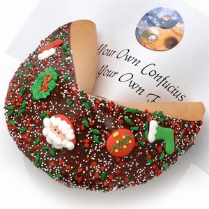 Giant Christmas Fortune Cookie includes your message inside as a 1 ft long fortune. Giant Fortune Cookie is dipped in your choice of chocolate, caramel or peanut butter.